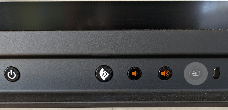 Bouton «source» du panneau de commande